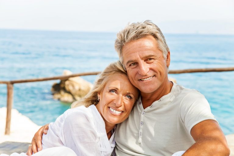 Mature couple near the ocean